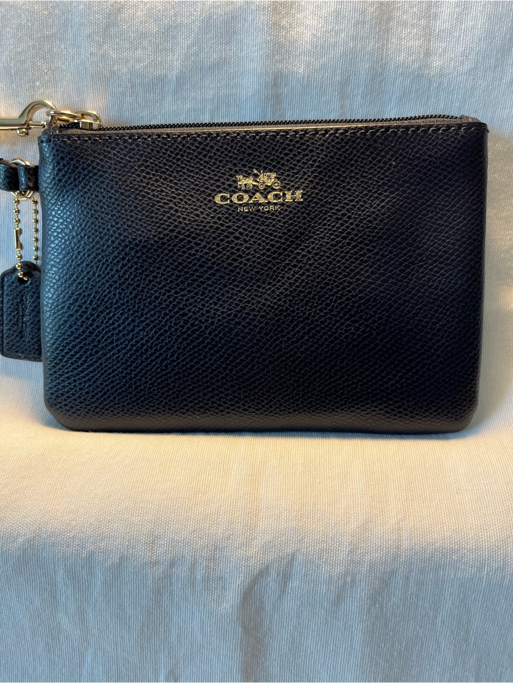 Coach Navy Blue Pebbled Leather Wristlet with Gold Logo and Hardware